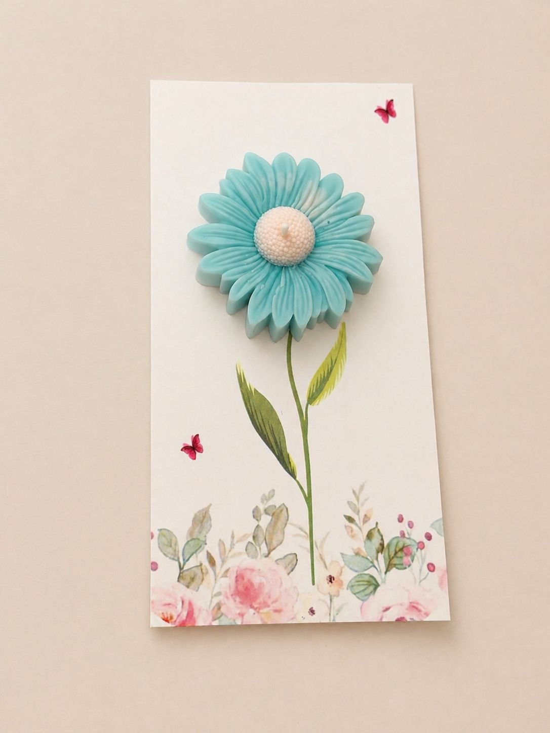 Vela floral artesanal azul turquesa