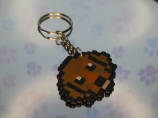 Llaveros perro marron artesanal hama beads resina pixel art