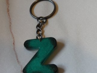 Llavero letra W blanco y verde glitter